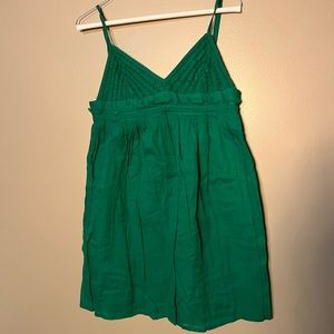 Strappy green sundress.